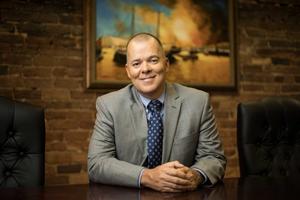 J. Dustin Riggs, CFP®